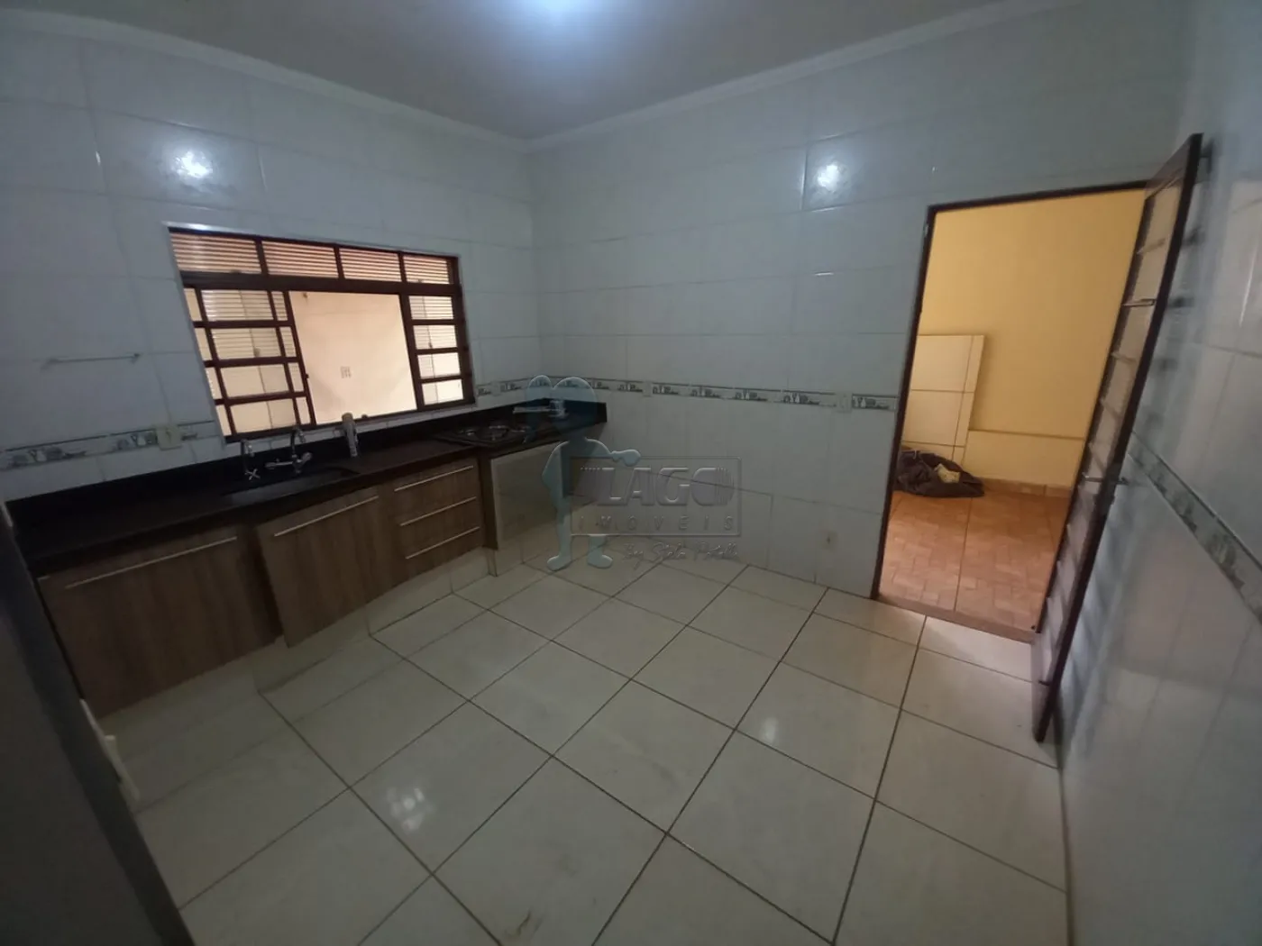 Alugar Casas / Padrão em Ribeirão Preto R$ 1.300,00 - Foto 1