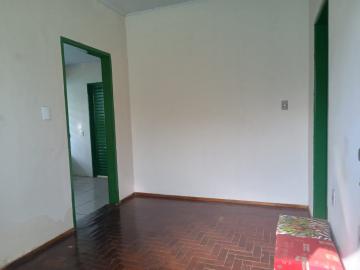 Alugar Casas / Padrão em Ribeirão Preto R$ 600,00 - Foto 1