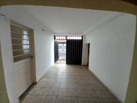 Alugar Casas / Padrão em Ribeirão Preto R$ 1.000,00 - Foto 1