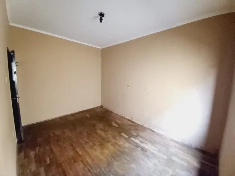 Alugar Casas / Padrão em Ribeirão Preto R$ 900,00 - Foto 1